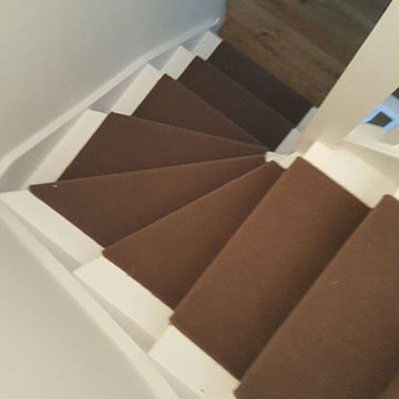 Installing Brown Whipped Carpet to Stairs as a Runner