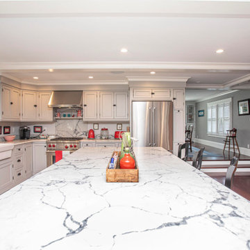Custom kitchen, dining room, entertainment center and laundry.