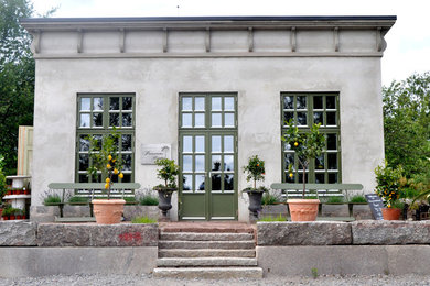 This is an example of a mediterranean sunroom in Stockholm.