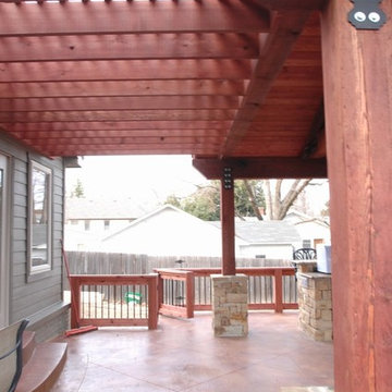 Outdoor Kitchen with Granite Countertops and Massive Open Ceilings