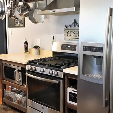 Pot rack and open cabinets made from reclaimed wood