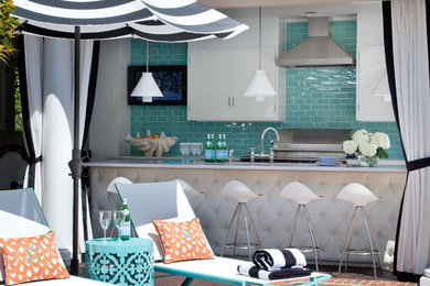 Inspiration for a mid-sized transitional backyard patio in Little Rock with an outdoor kitchen and a gazebo/cabana.