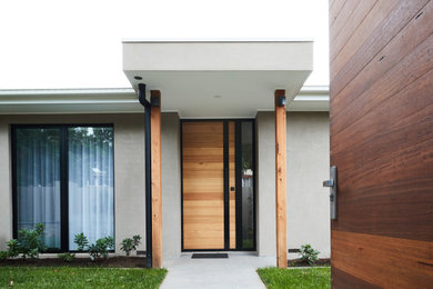 Inspiration for a contemporary entryway in Melbourne.