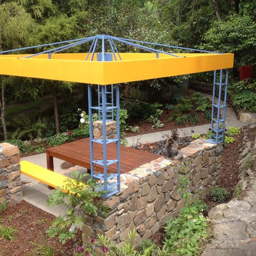 After construction showing detail of pergola and stone wall construction.