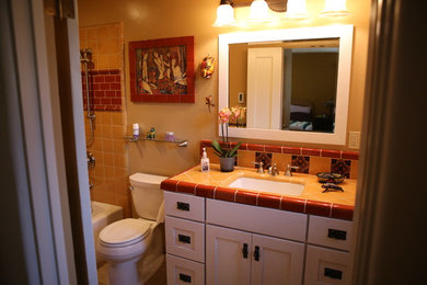 Bathroom - traditional yellow tile bathroom idea in San Diego