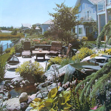 Waterside deckscape with stunning waterfeature
