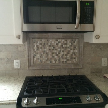 Tumbled Travertine Backsplash With Medallion