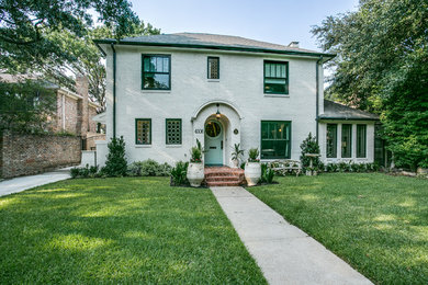 Example of a transitional exterior home design in Dallas