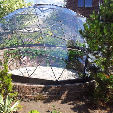 Geodesic dome skylight over sunken garden