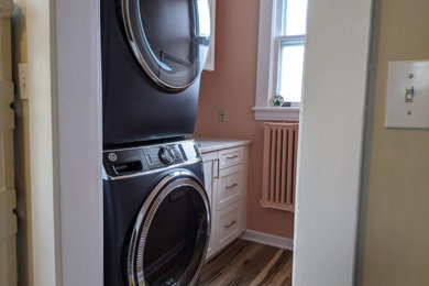 Laundry room - transitional laundry room idea in Other