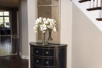 Inspiration for a mid-sized transitional dark wood floor and brown floor hallway remodel in Philadelphia with gray walls