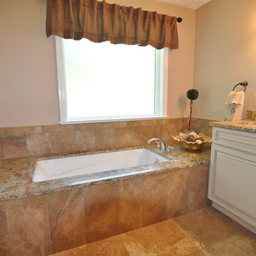 Tuscan-Inspired Master Bathroom / Little Girls' Bathroom