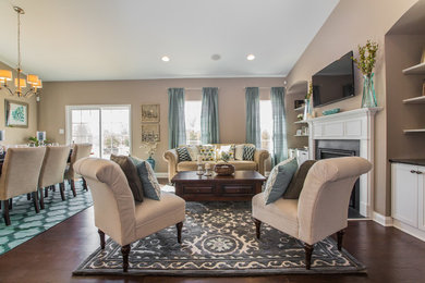 Living room - mid-sized transitional open concept dark wood floor living room idea in Philadelphia with beige walls, a standard fireplace, a wood fireplace surround and a wall-mounted tv