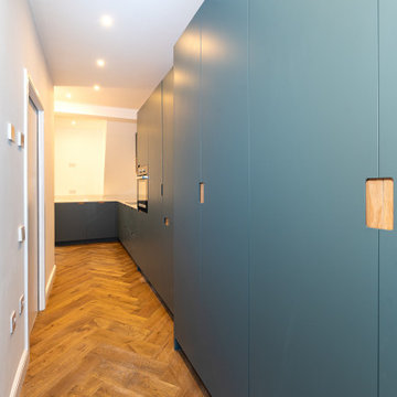 Modern Wraparound Kitchen Extension with Steel Blue Design in West London