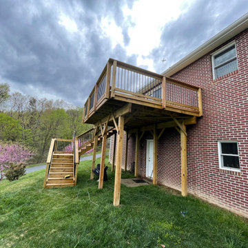 Deck stain and gutters powerwash