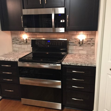 cabinet refacing--birch espresso cabinets with backsplash