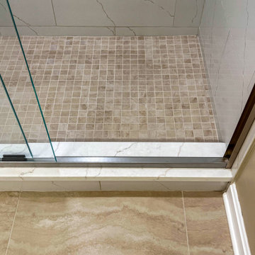 Timeless White Vanity Paired with Luxury Tiled Shower