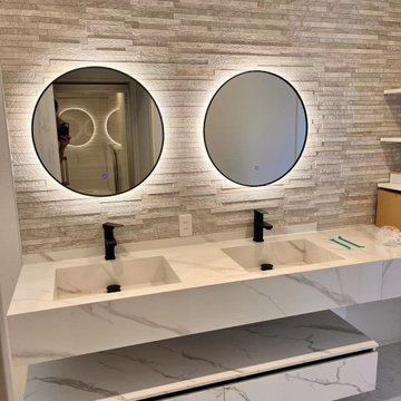 Detailed Close-Up – Backlit Mirrors & Integrated Vanity Countertop