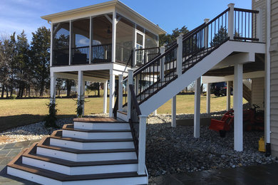 Deck - mid-sized transitional backyard deck idea in DC Metro with no cover