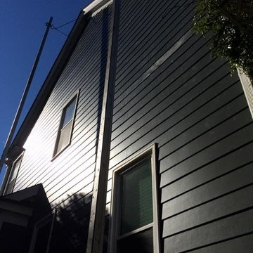 Charlotte, NC, upscale vinyl siding replacement by Belk Builders.