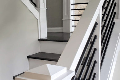 Example of a trendy staircase design in Seattle