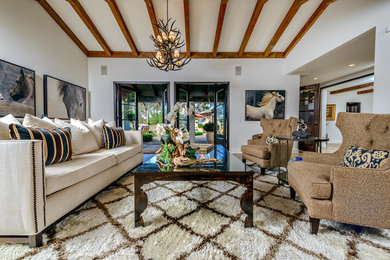 Large mountain style formal and open concept light wood floor and brown floor living room photo in Orange County with white walls