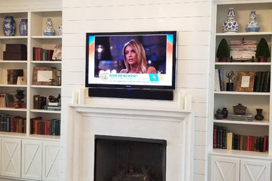 Example of a transitional family room design in Nashville