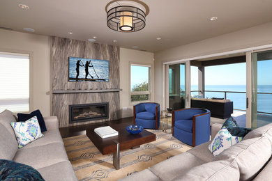 Photo of a large contemporary open concept living room in San Francisco with grey walls, dark hardwood floors, a ribbon fireplace, a stone fireplace surround and a wall-mounted tv.