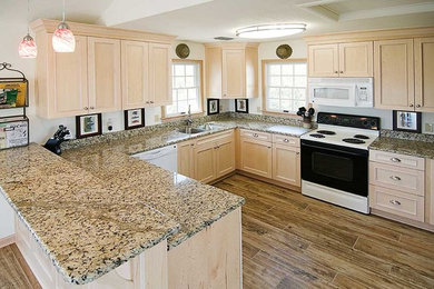 Example of a classic kitchen design in Other