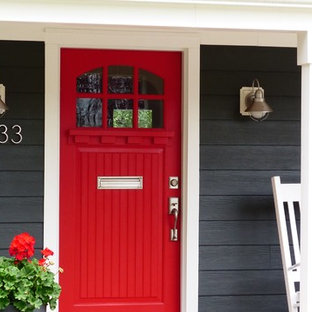 ワシントンD.C.の中サイズのカントリー風おしゃれな前庭のテラス (張り出し屋根、レンガ敷き) の写真