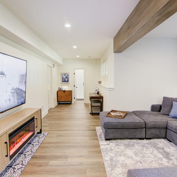 Warm & Inviting Basement Retreat with Kitchenette and Reading Nook