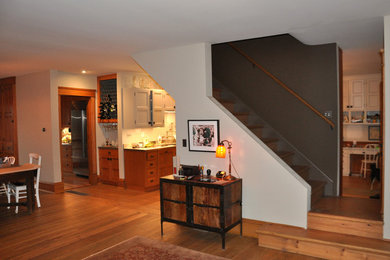 Staircase - cottage wooden straight wood railing staircase idea in New York with wooden risers