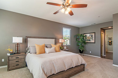 Design ideas for a transitional bedroom in San Diego.