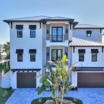 Grand Coastal Home with Symmetrical Staircase