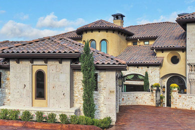 Inspiration for a mediterranean exterior home remodel in Austin