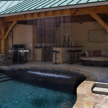 Backyard Transformation with Outdoor Kitchen & Waterfall