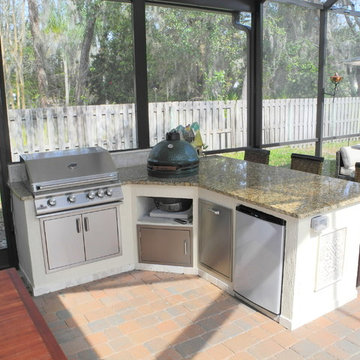 Outdoor kitchen with extended roof.