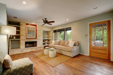 Example of a transitional living room design in Austin
