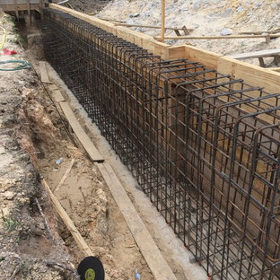 Steel cage for retaining wall of house.