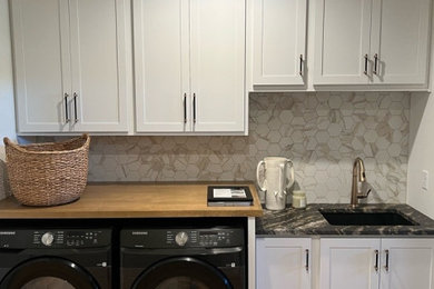 Example of a laundry room design in Other