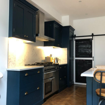 Stunning classic dark blue kitchen with a cafe style feel