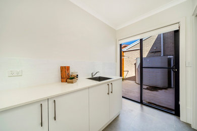 Photo of a modern laundry room in Canberra - Queanbeyan.