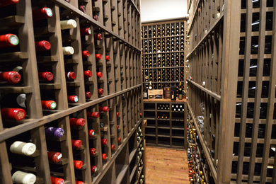 Design ideas for a rustic wine cellar in Orange County.
