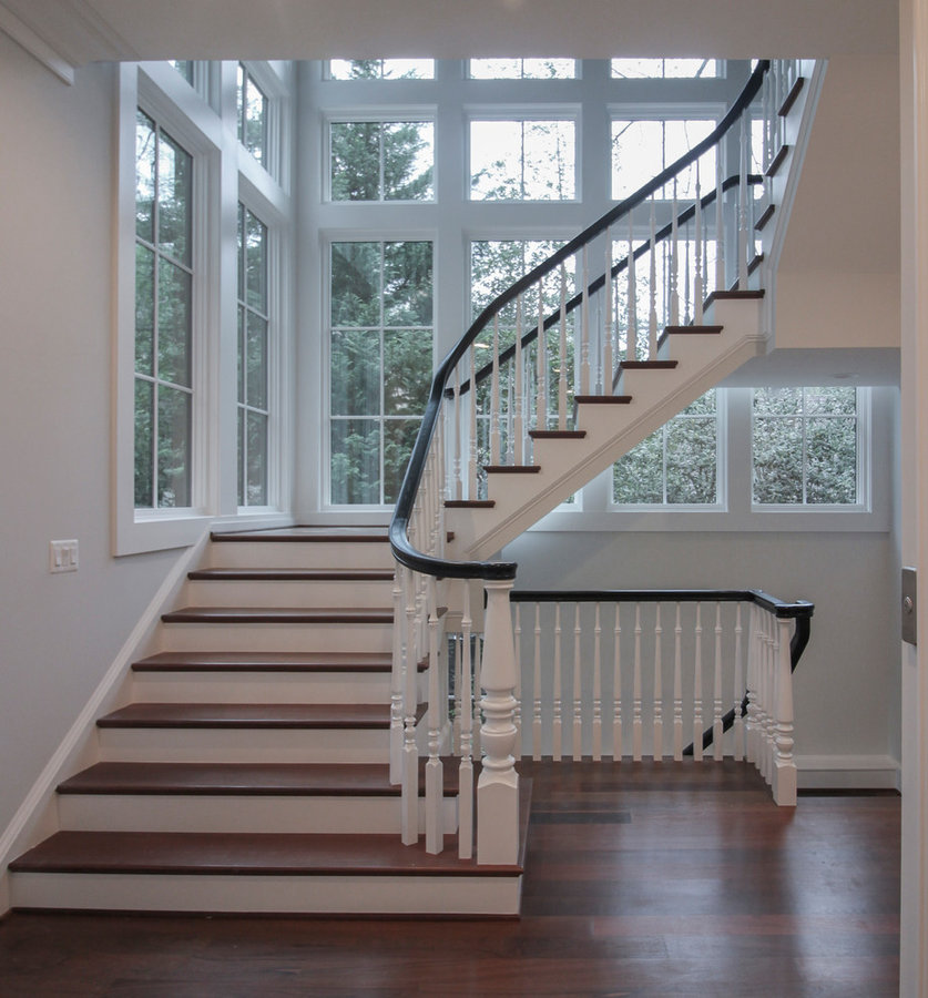Powerful Impression by Floating Staircase in Suburban Foyer