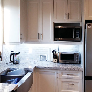 White Kitchen with Custom Storage in Etobicoke