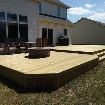 Two-level pressure treated deck with fire pit in southwest Fort Wayne