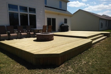 Two-level pressure treated deck with fire pit in southwest Fort Wayne