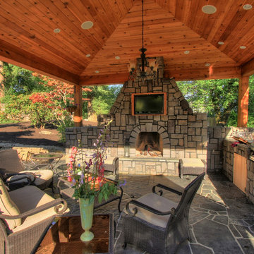 Outdoor living, gazebo, outdoor fireplace, water feature.