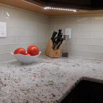 Carr Project - Glass is reflexive of color and light.in the room.