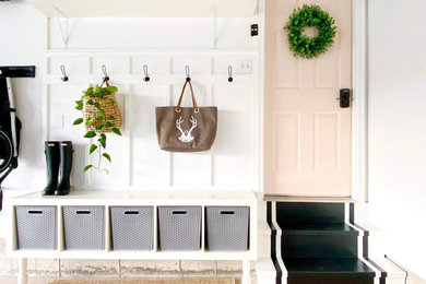 Inspiration for a mid-sized country attached two-car garage remodel in Bridgeport